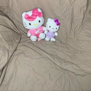 2 hello kitty plushies